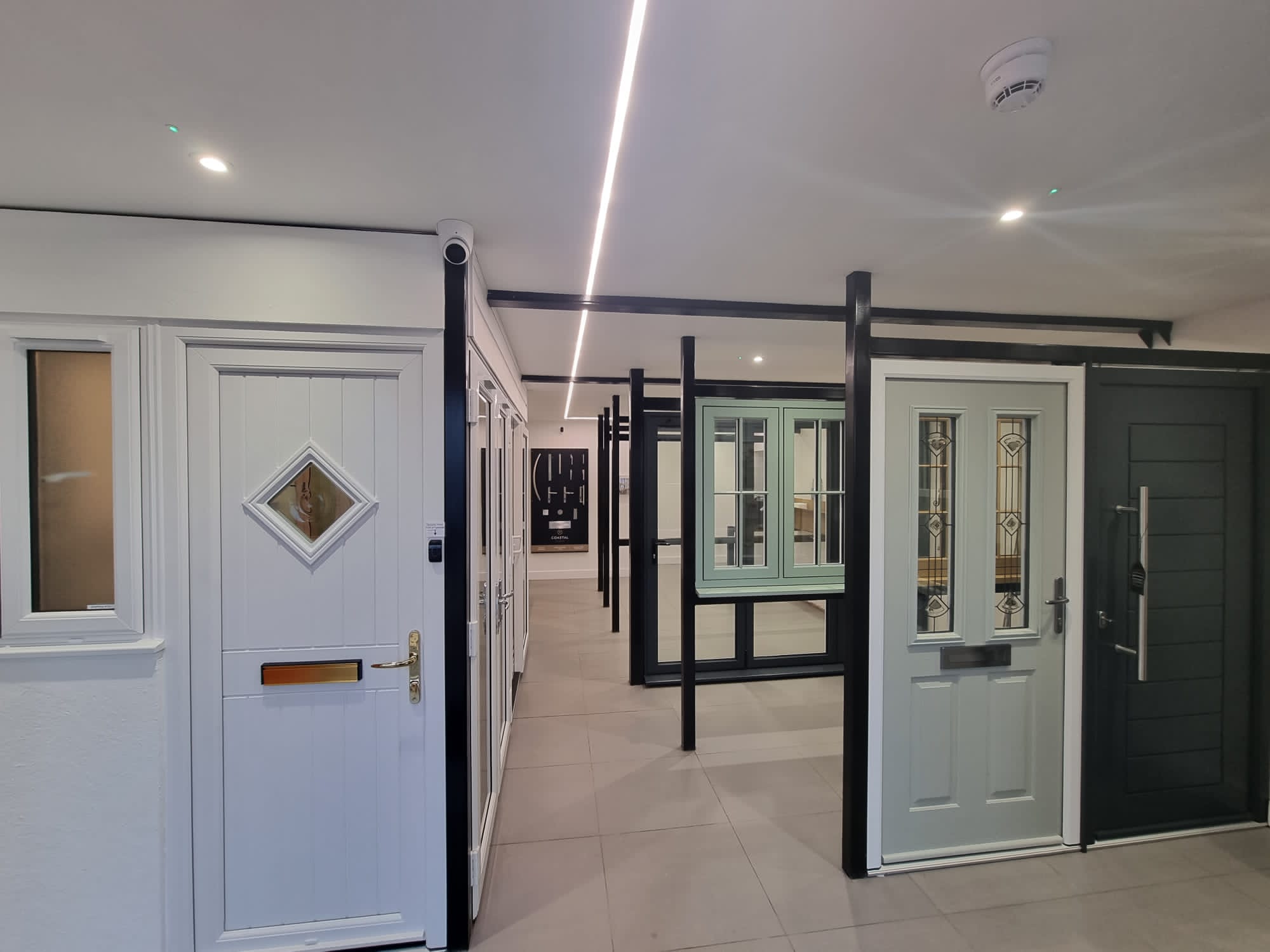 A selection of front doors in a showroom