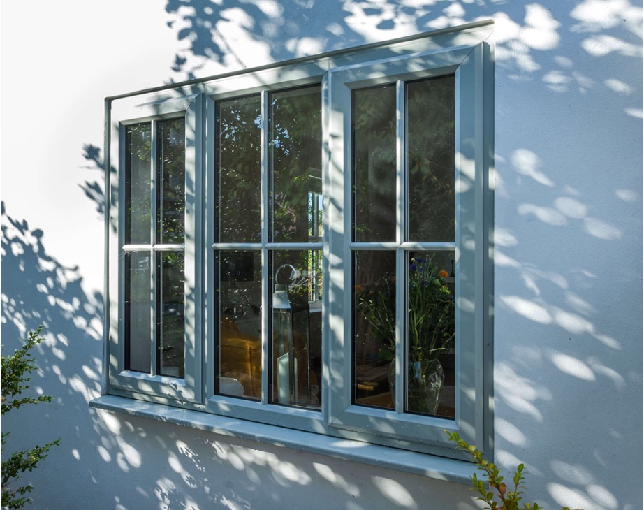 Set of windows in a white-walled house
